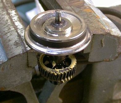 wheel assy hanging from a vice