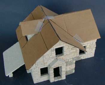 farmhouse with temporary roof